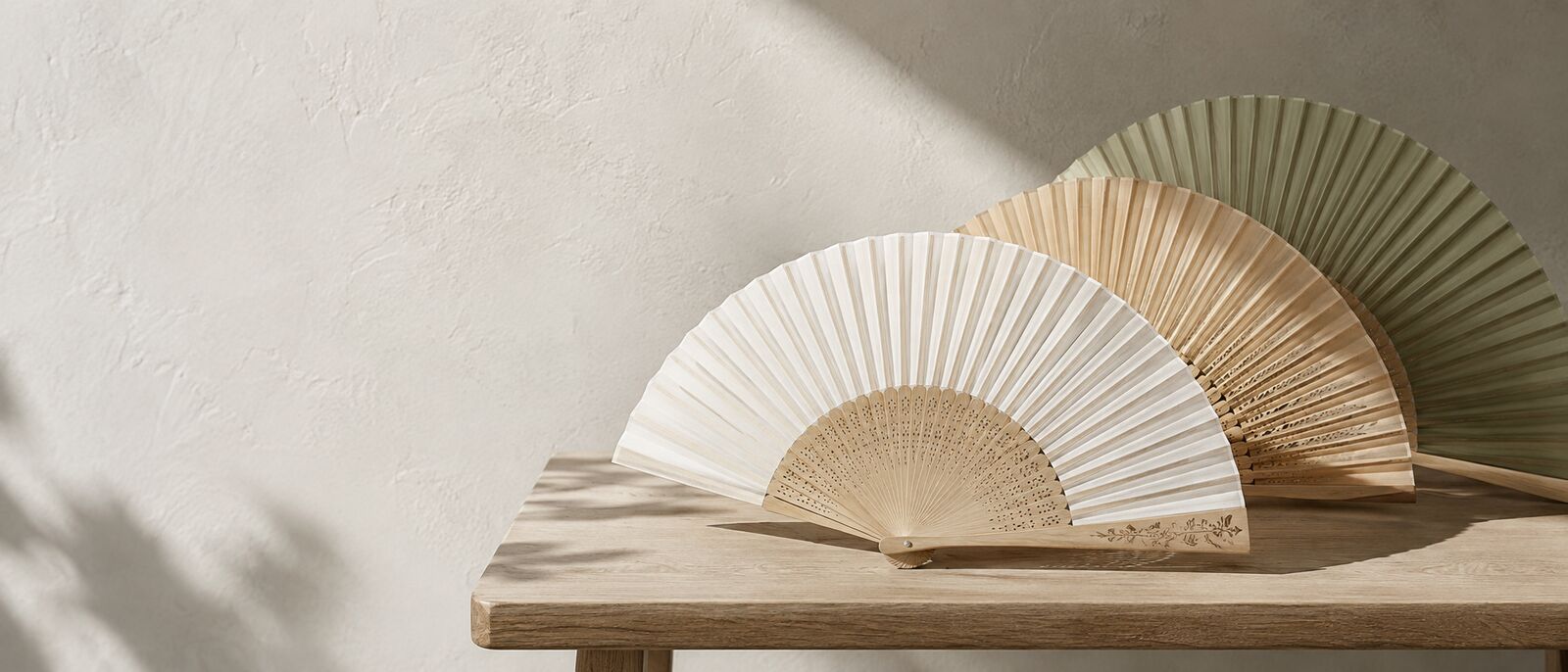 Custom printed bamboo hand fans with a logo