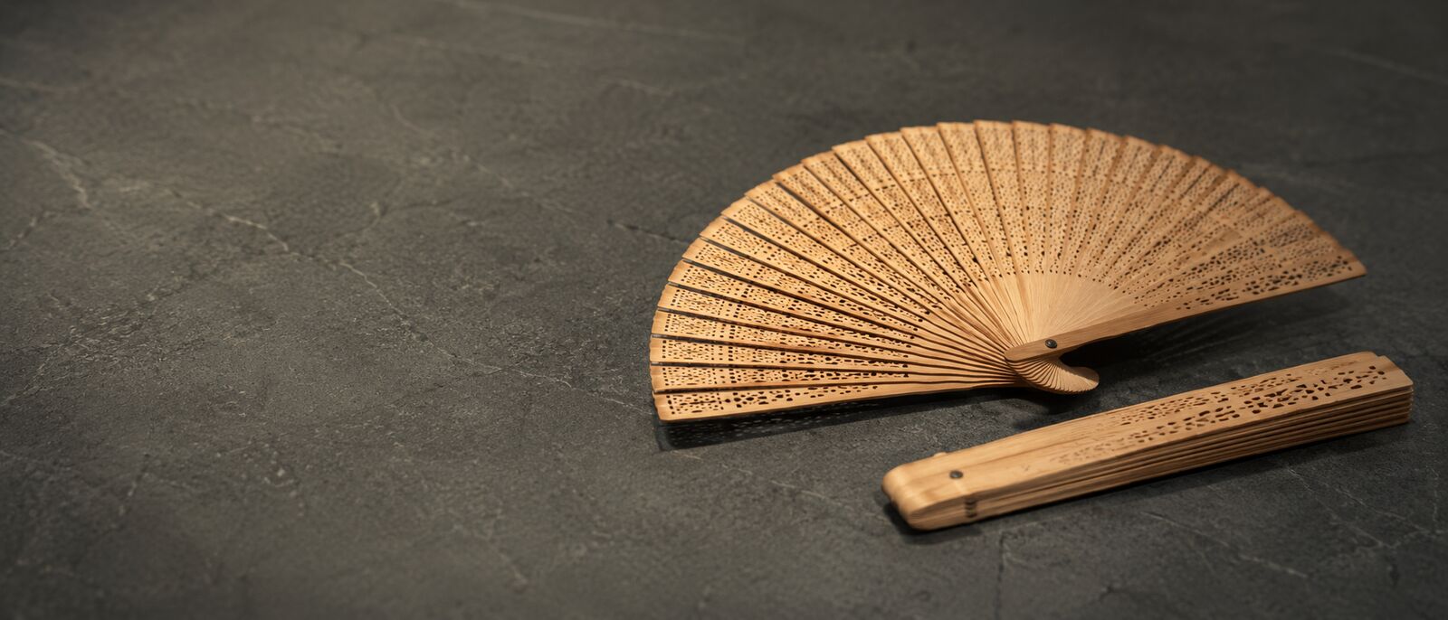 Custom printed wooden hand fans with a logo